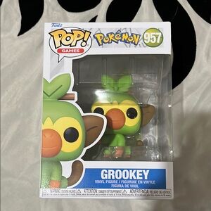 Funko Green and Brown Grookey Figurine with Leafy Tufts